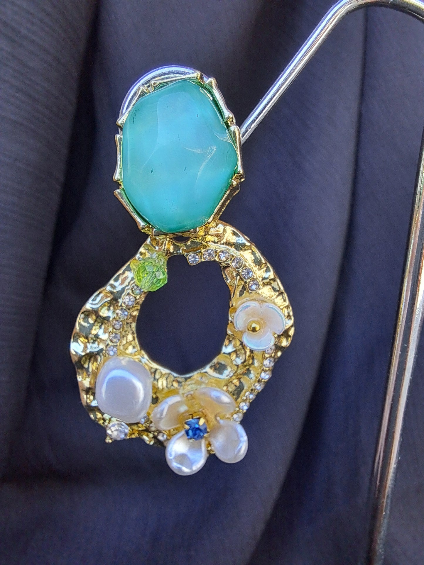 Pendientes verde océano