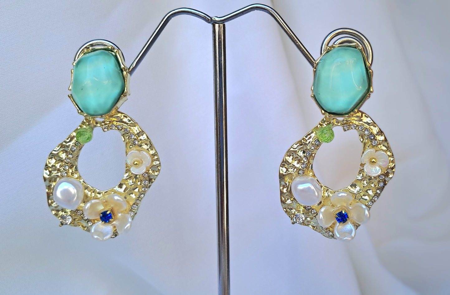 Pendientes verde océano